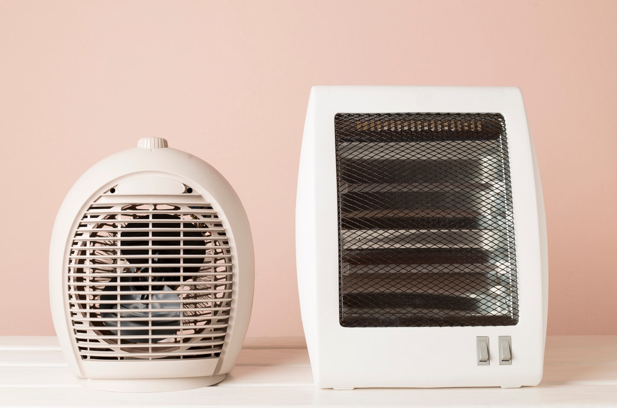 A photo of two types of space heaters.